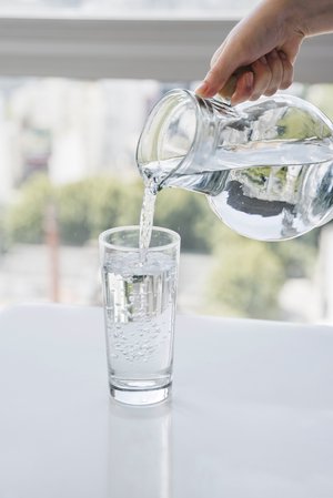 jar-filling-glass-water
